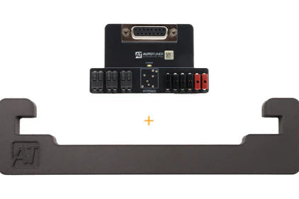 Black electronic module with connectors on a white background