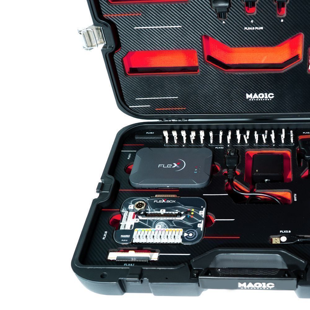 Open tool case with various tools and components on a white background