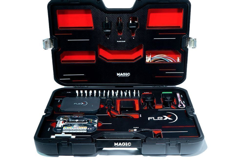 Open tool case with tools and components on a white background
