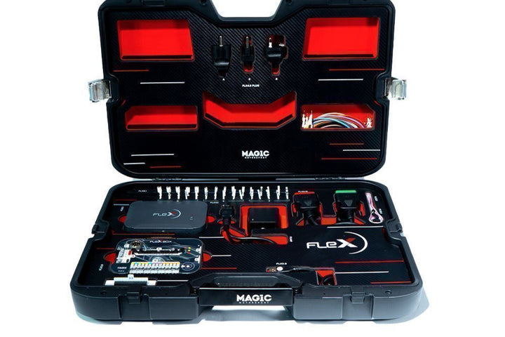 Open tool case with tools and components on a white background