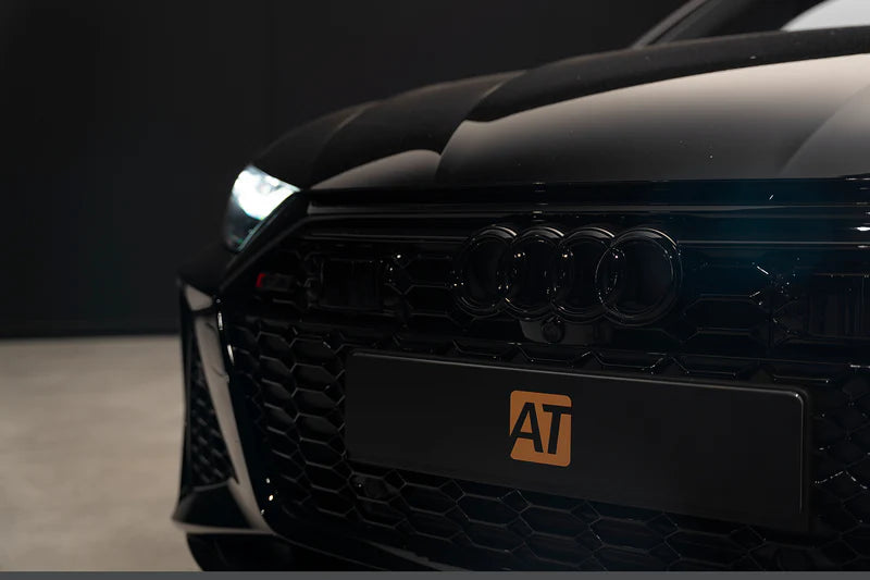 Matte AutoTuner plate cover on performance vehicle