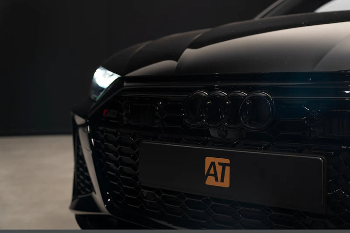 Matte AutoTuner plate cover on performance vehicle