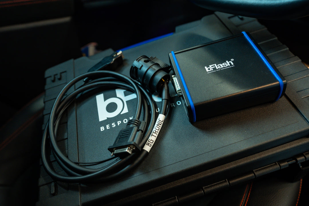 Close-up image of bFlash cable plugged into 8G gearbox interface