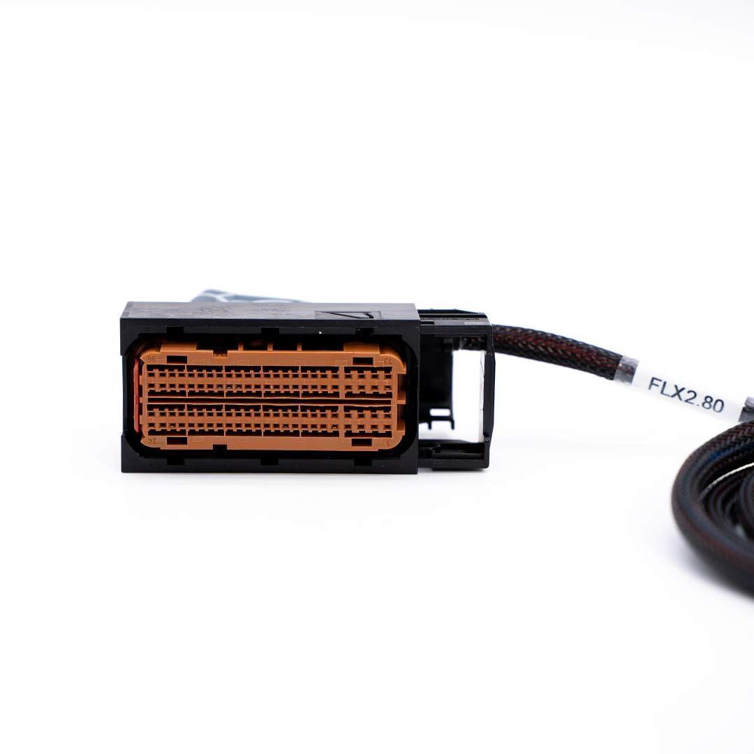 Electronic connector with orange contact area on a white background