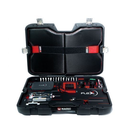 Close-up of interior compartments holding tuning tools and cables