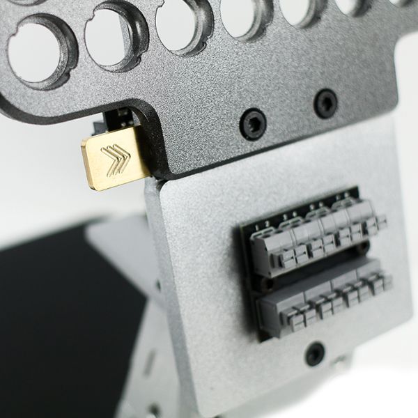 Close-up of MAGBench’s 56-hole positioning grid with mounted probes