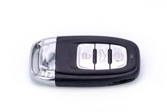 Front of Audi remote key with 3 silver buttons and HU66 blade

