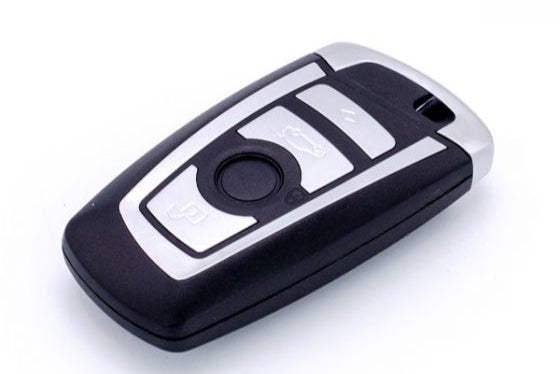 Front view of BMW remote key HU100 868MHz with silver trim

