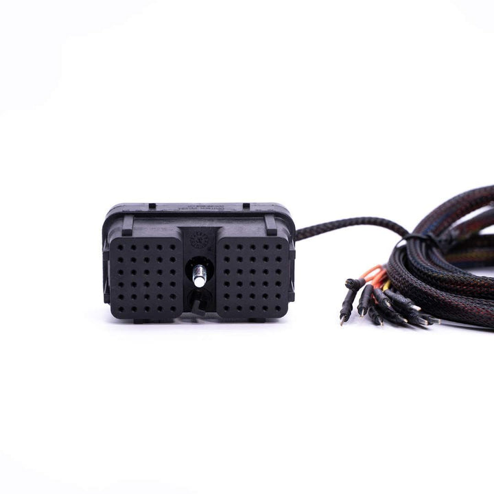 Black electronic device with a cable on a white background